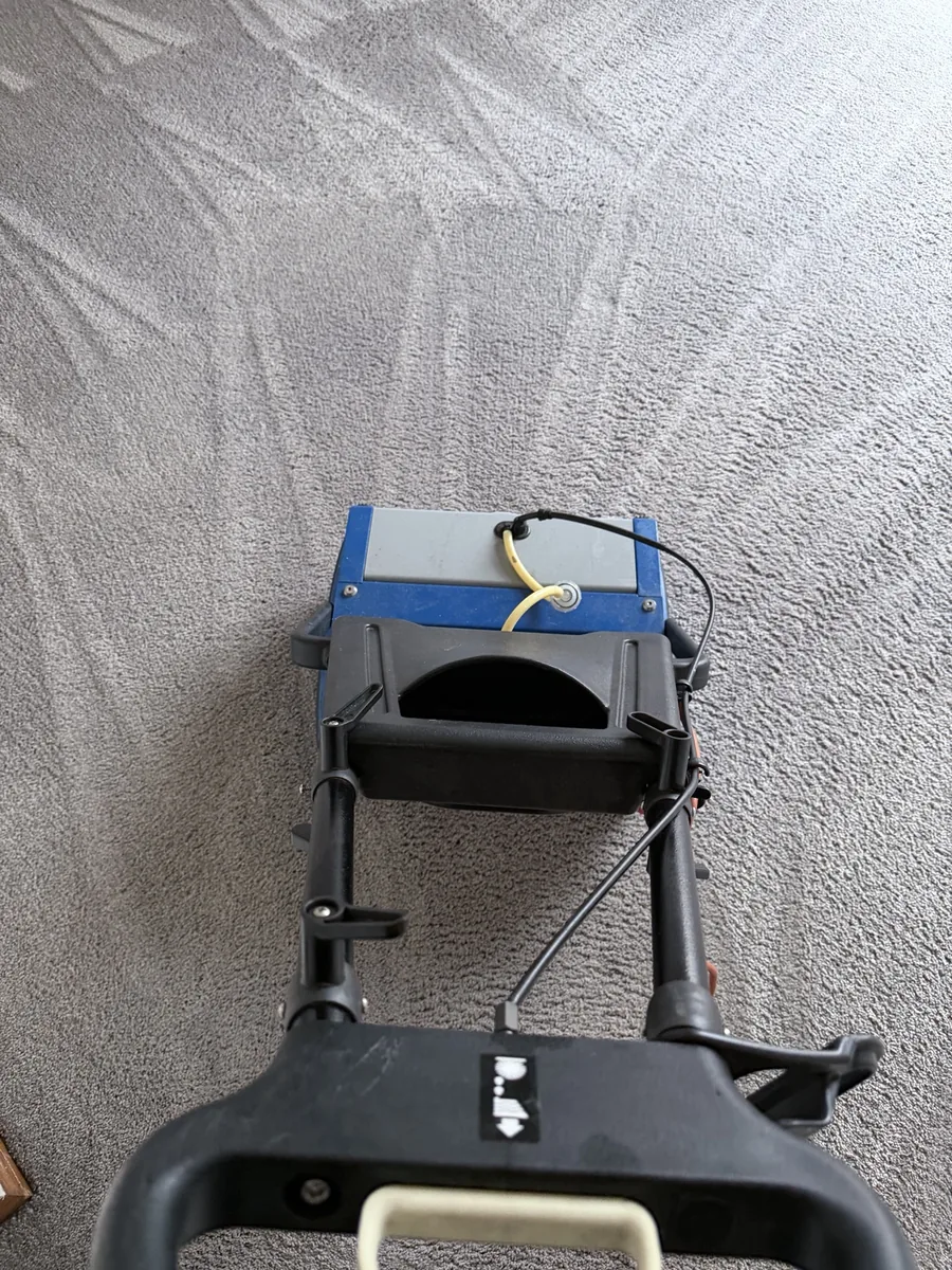 Fastline encapsulation cleaning machine on a grey carpet